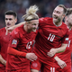 Kasper Dolberg (No. 12) and the Denmark squad